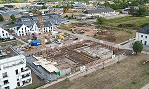 Luftbild ZENZ-Massivhaus Baustelle in Saarburg im Bereich Wohnungsbau 